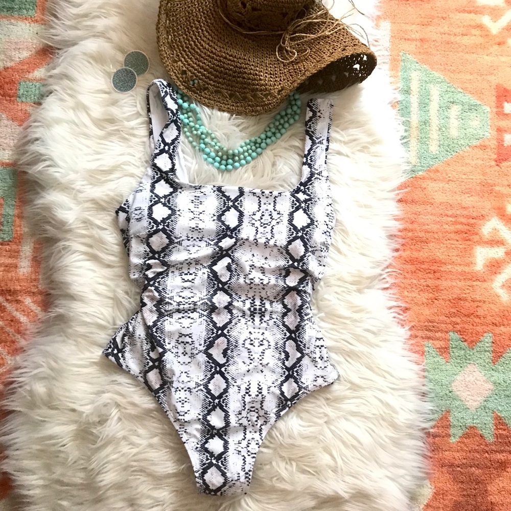 Size large waist flattering one piece